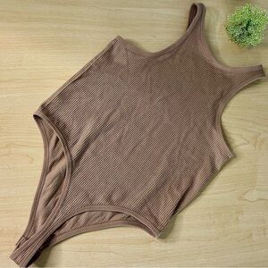 Nude small body shaping bodysuit, ribbed high neck size small